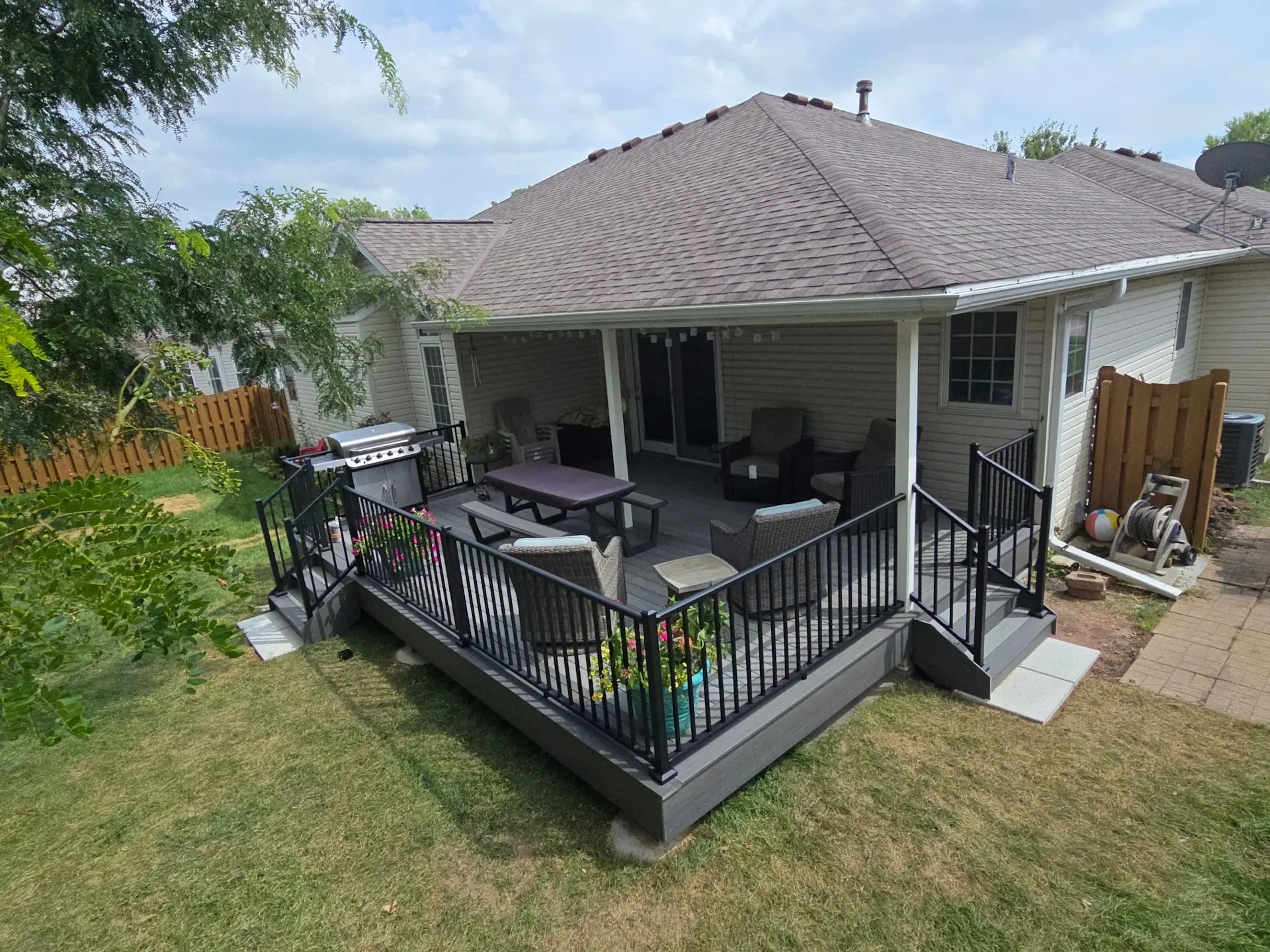 Composite deck with metal railings