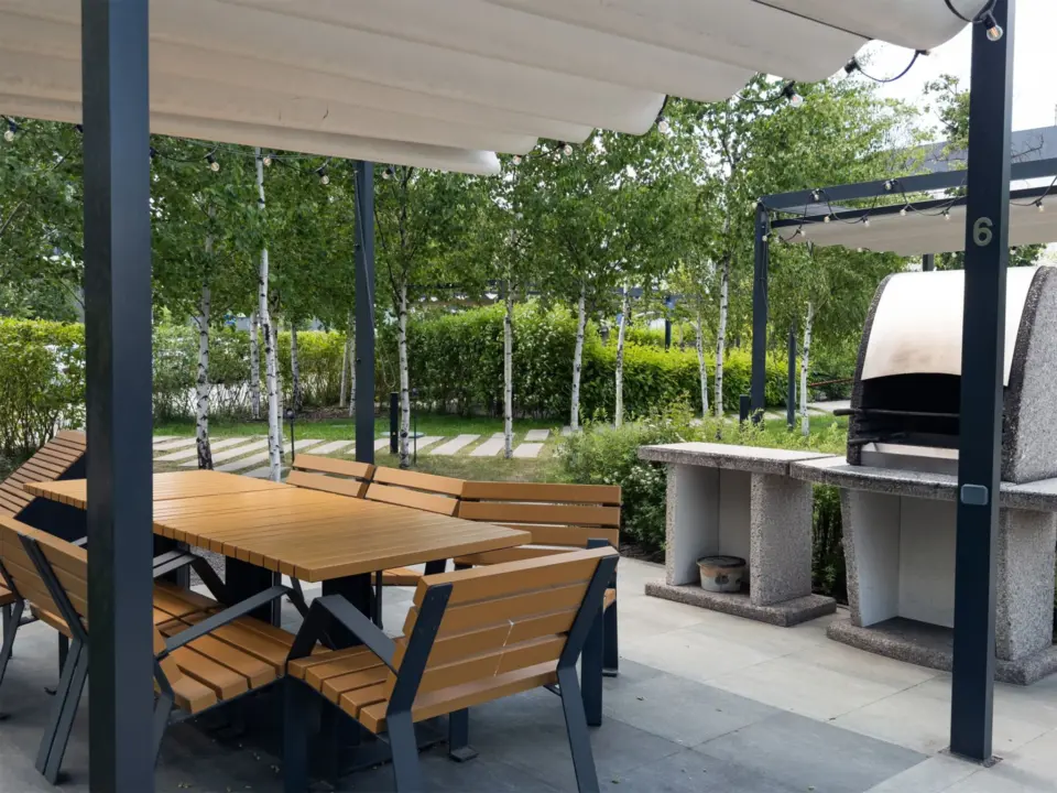bbq-area-outdoor-living-with-lighting-on-a-patio-with-nature-scenery-on-the-background-in-lincoln-ne