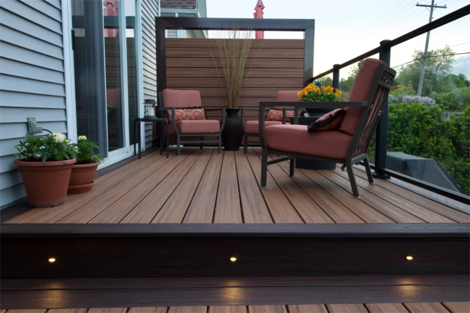 custom-residential-deck-glass-railing-privacy-wall-and-deck-lighting-in-lincoln-ne