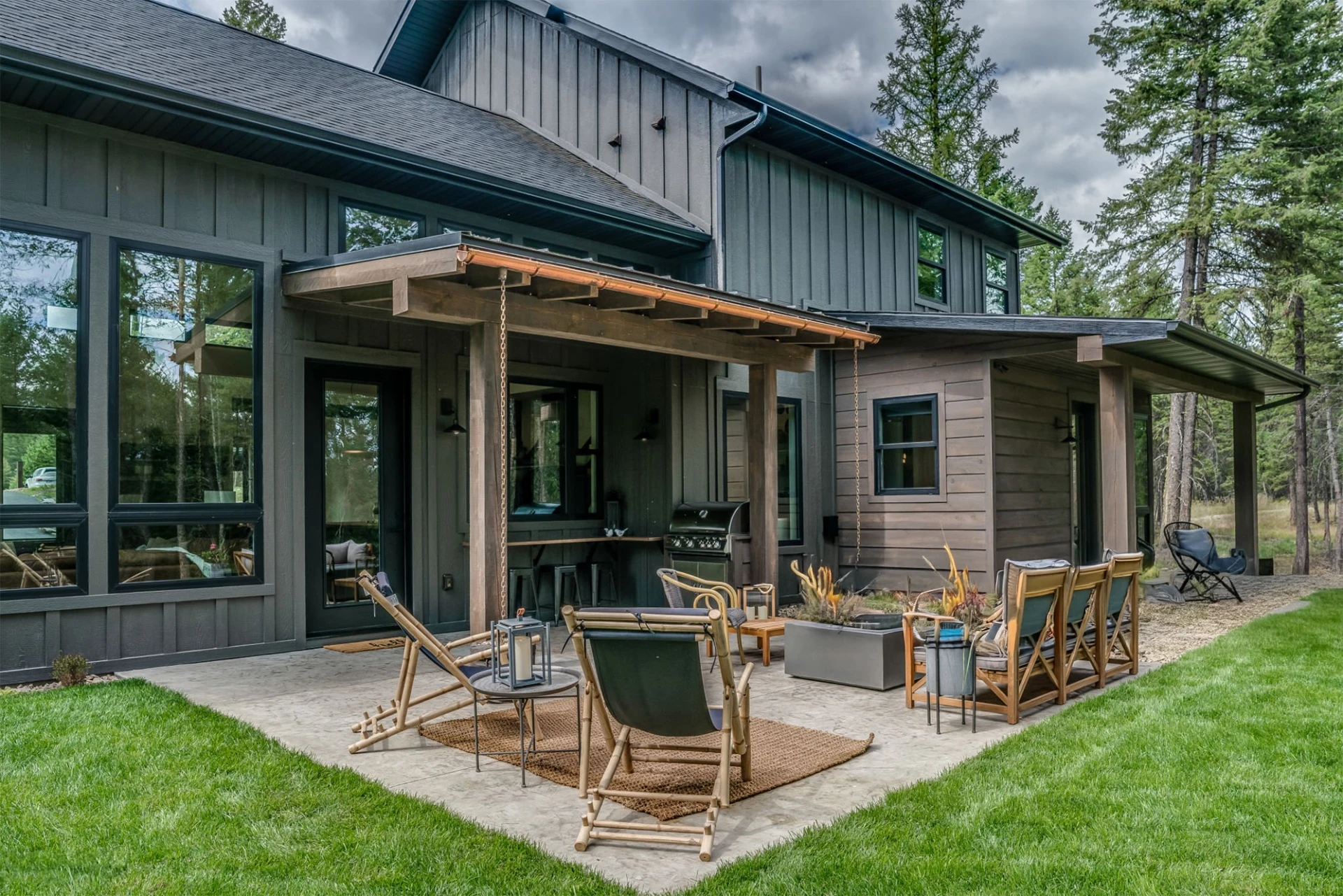 green-grass-surrounding-porch-with-big-trees-on-the-background-in-lincoln-ne
