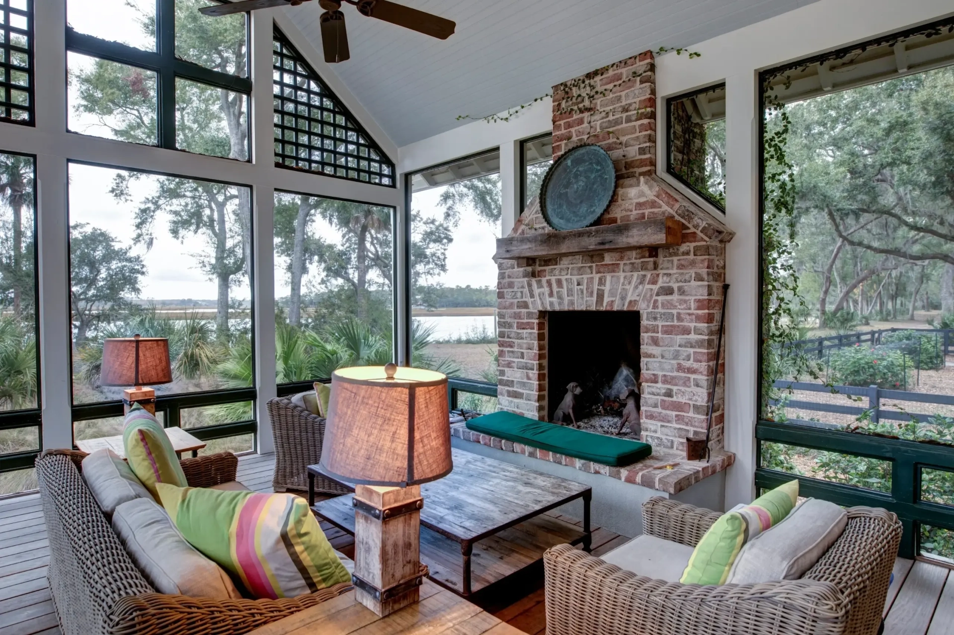 luxurious-three-season-screen-porch-with-fireplace-and-nature-scenery-on-the-outside-in-lincoln-ne