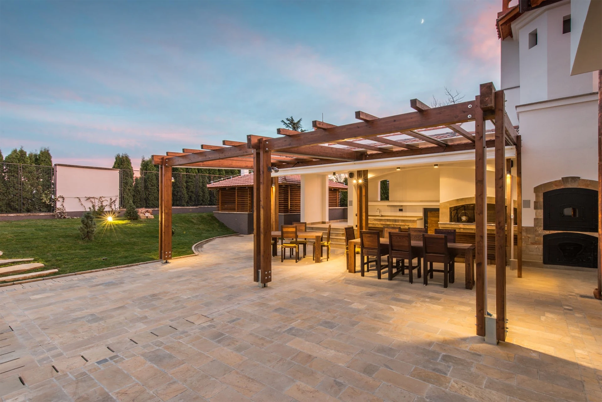 luxurious-villa-exterior-outdoor-living-with-pergola-and-lighting-in-lincoln-ne