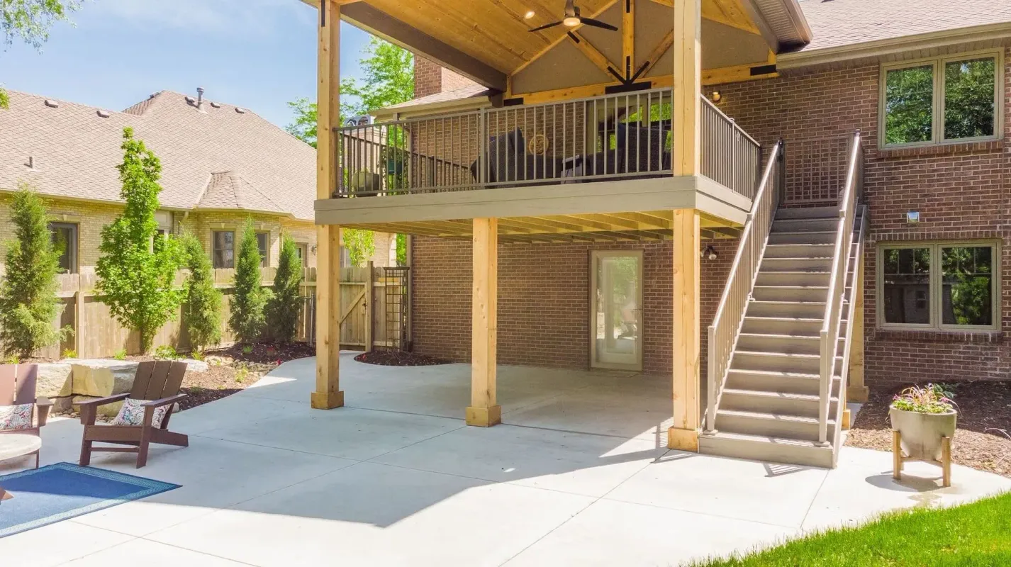 wooden-under-deck-with-railing-and-porch-on-the-top-with-furniture-in-lincoln-ne